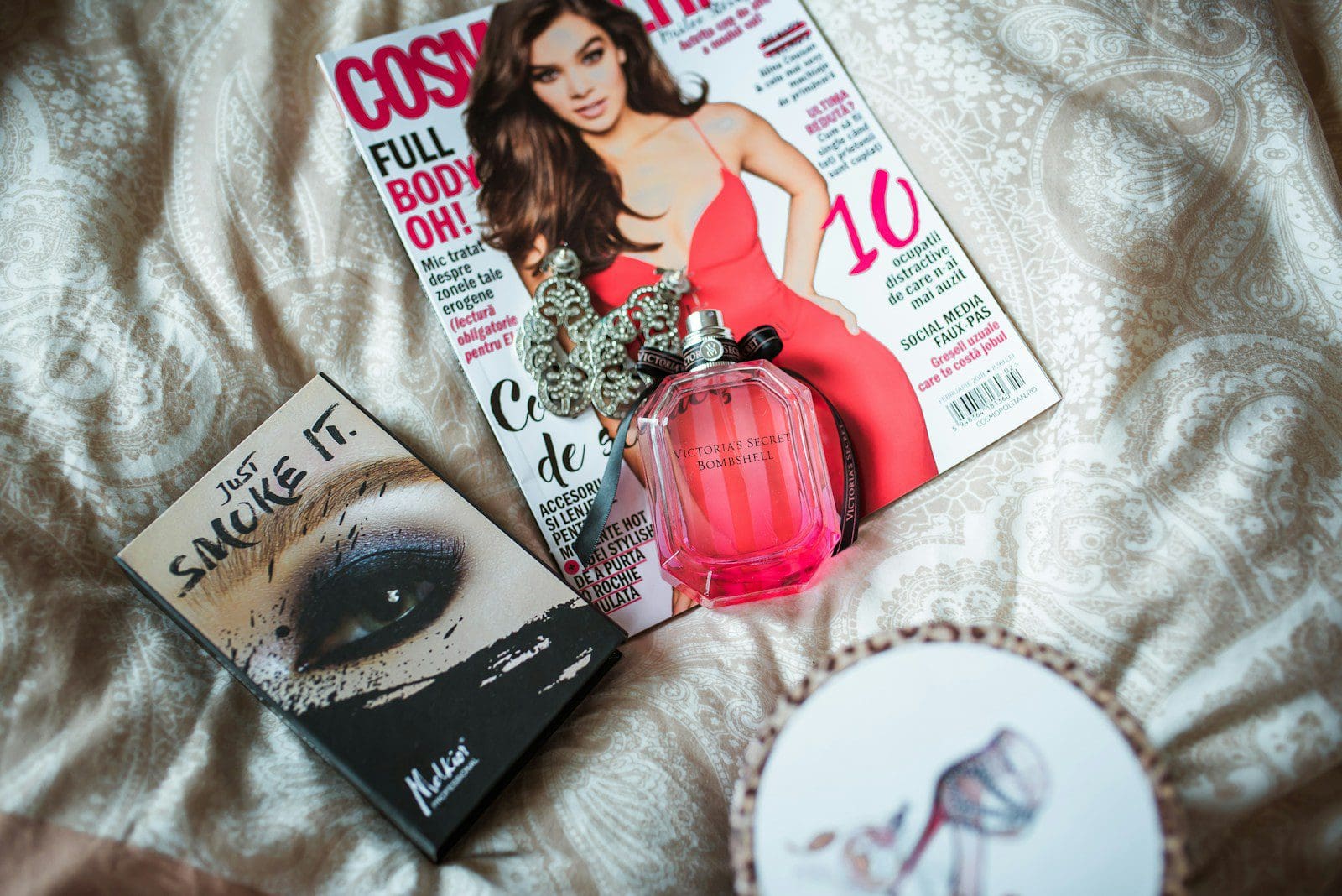 Redefining Beauty Standards: Embracing Authenticity and Inner Strength 1 Cosmopolitan magazine on white textile. Redefining beauty standards.