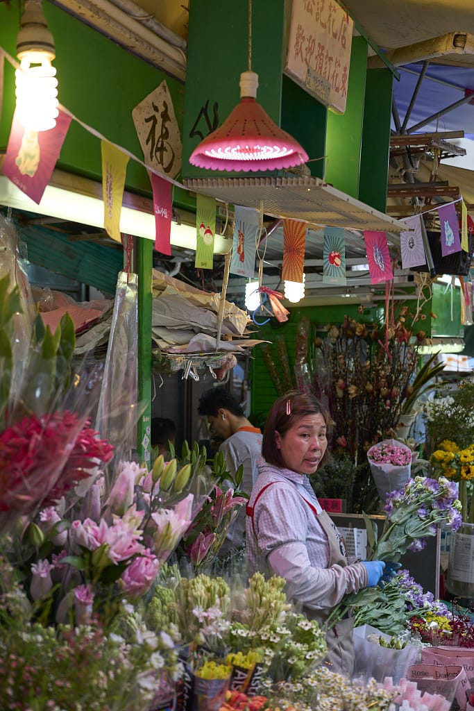 48 Hours in Hong Kong: A Power Packed Adventure 2 48 hours in hong kong. picture shows a flower store along the winding streets