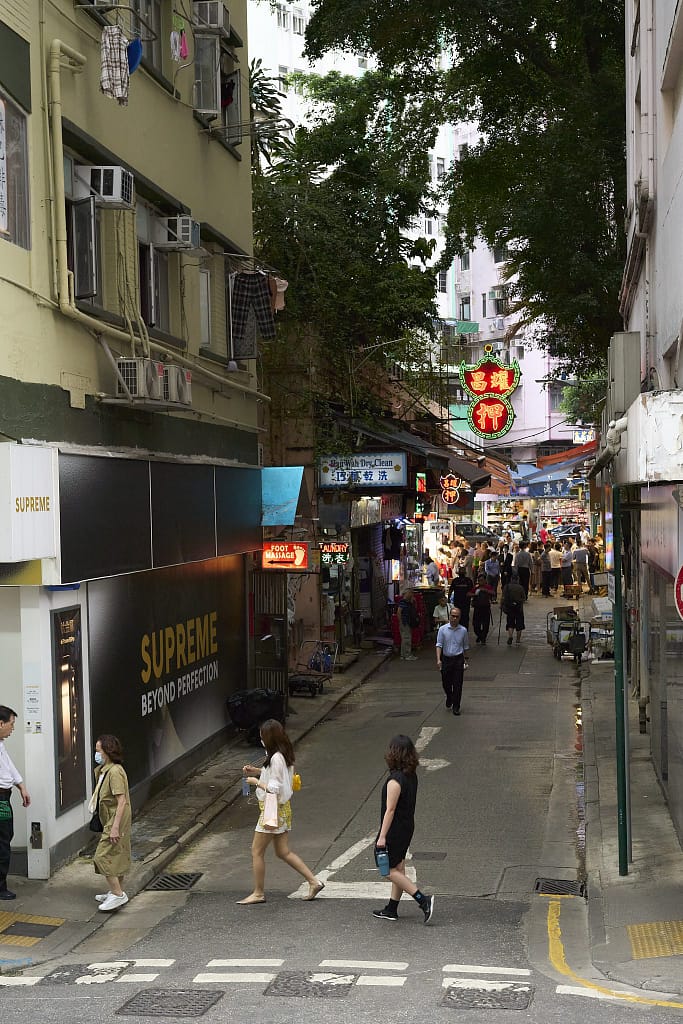 48 Hours in Hong Kong: A Power Packed Adventure 3 48 hours in hong kong. picture shows a narrow street with pedestrians