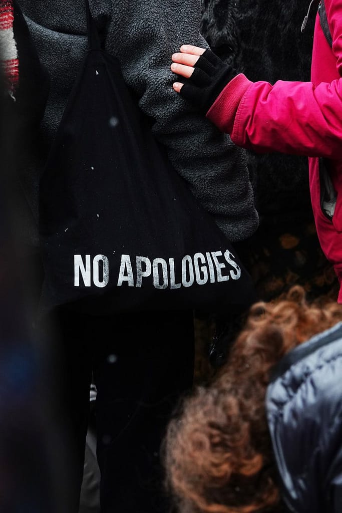 Stop Apologizing: Mastering Confidence in Business Relationships 1 Confidence in business relationships a group of people standing next to each other